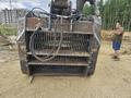 Инновационный дробильный ковш-шредер на Hitachi-450